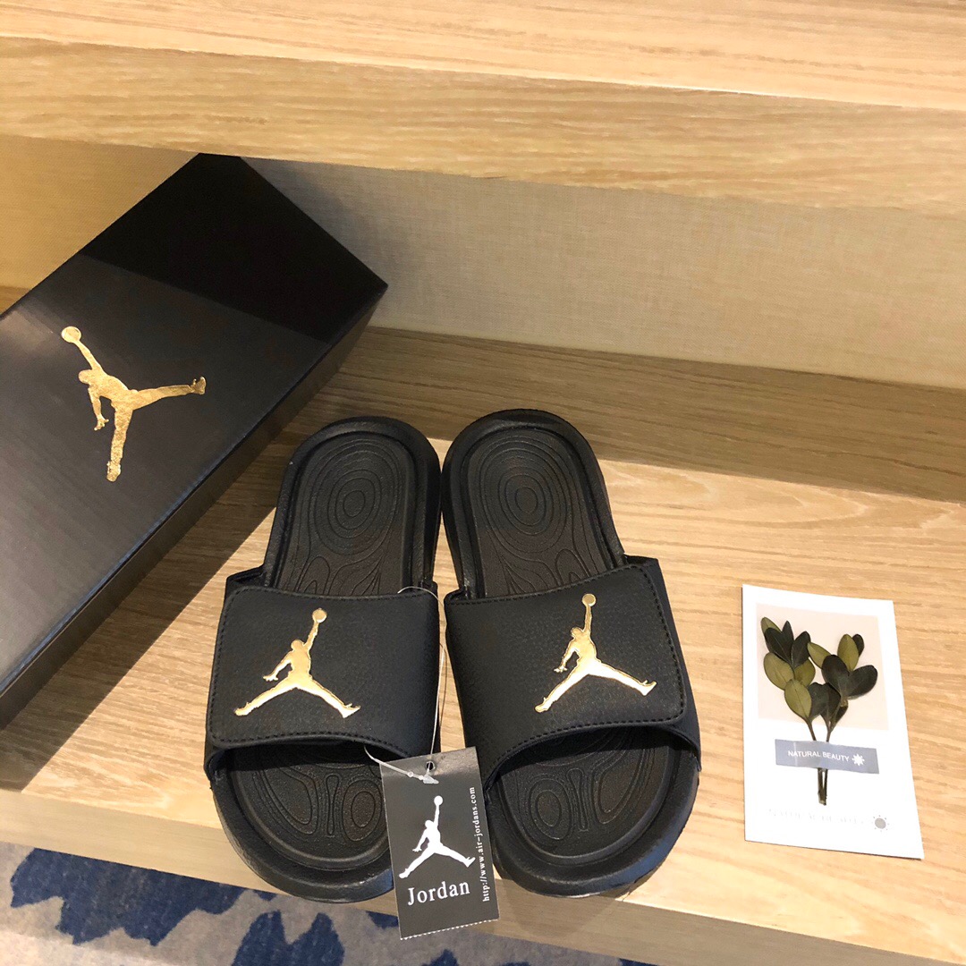 Jordan slippers hotsell black and gold